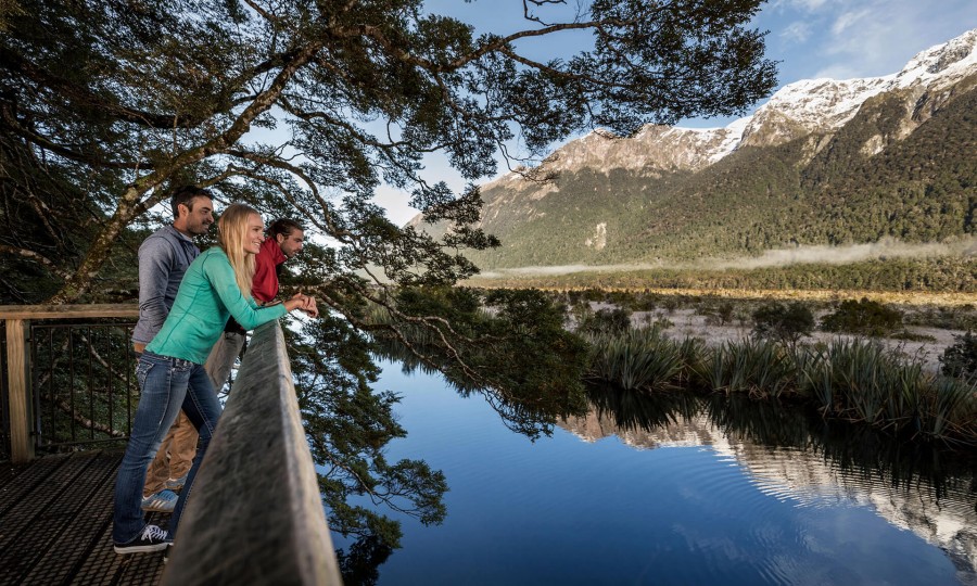 Enjoying perfect reflections at Mirror Lakes on the road to Milford Sound